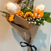 Brighten someone's day with our Golden Sunshine Teddy Bouquet, a cheerful handcrafted