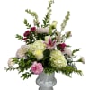 Pink and white mixed flower arrangement in a white vase