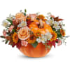 Pumpkin-shaped vase with peach roses and autumn flowers