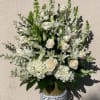 May contain white roses, snapdragons, hydrangeas and lily stargazers fitted into an