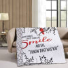 Quilted throw blanket with a cardinal and the words "Smile" and "I know that was you"