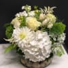 White floral arrangement in a low glass bowl