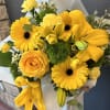 all yellow wrapped bouquet 