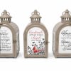 Three decorative lanterns with printed memorial and home quotes