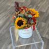 Sunflowers and mixed autumn flowers in a white hat box