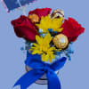 Deep red roses mingle with bright yellow daisies and tiny blue filler