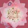 A rounded dome of white tulip buds kissed with soft pink tips