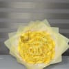 Bouquet of yellow roses wrapped in pale yellow paper with a butterfly decoration