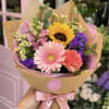 A petite, hand-wrapped bouquet inspired by fresh flower market finds. The Market