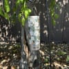 Decorative hanging wind chime with daisies and bees