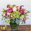 Feminine display of pastels, soft and elegant in a mid height vase.