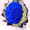 Bouquet of vivid blue roses with white baby's breath