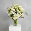 Elegant, serene, and timeless, Eternal Grace Tribute is a luxurious all-white arrangement