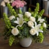 Serene Grace is a timeless expression of elegance, blending crisp white blooms