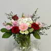 Indulge in a symphony of romance with the Romantic Elegance arrangement by
