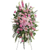 Tall pink floral standing spray on a black easel
