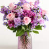 Soft pink roses take center stage in this Day Dream bouquet, surrounded