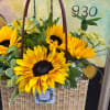 Bright, hearty sunflowers take center stage in this Father's Day flower arrangement