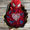 Spider-Man plush atop a bouquet of red roses with blue accents