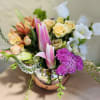 Even more blooms added to make this bouquet large and lush!