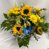 Bouquet of yellow sunflowers and daisies with a blue butterfly decoration