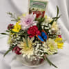 A cozy cluster of mixed roses, daisies, alstroemeria and chrysanthemums arranged in
