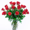Bouquet of red roses in a clear glass vase