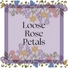 Decorative sign reading Loose Rose Petals with floral border