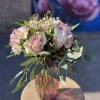 Pink and white bouquet in a glass vase