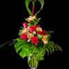 Vivid red roses clustered with soft peach-pink alstroemeria create a romantic focal