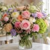 Soft garden pastels come together in a romantic flower arrangement perfect for