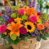 A vibrant, garden-fresh presentation that feels like sunshine in a basket-this flower