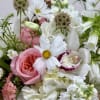 Pink rose bouquet with white flowers and green filler