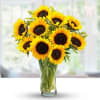 Bouquet of sunflowers in a clear glass vase