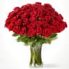 Bouquet of red roses in a clear glass vase