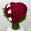 Heart-shaped bouquet of red roses with white orchids