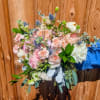 Choose this bouquet for a spring or summer wedding, garden ceremony, or