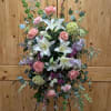 Standing spray includes, White Lilies, Pink &amp; White  Roses, Hydrangeas, Violet