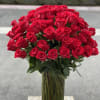 Bouquet of red roses in a clear glass vase