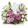 A soft halo of lavender-pink roses and pale pink-and-white daisy-like blooms cradles