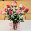 Our exquisite bouquet of magnificent, long-stem assorted roses, hand-crafted by our expert