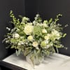 A loose and airy garden mix in creamy white blossoms. Delivered in