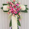 Cross-shaped floral spray with pink and white flowers