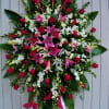 An assortment of premium flowers which include orchids, ginger, stargazer lilies, casablanca