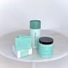 Spa gift set with soap, shower steamers, and sugar scrub in mint packaging