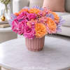 A vibrant and luxurious floral arrangement designed with premium garden roses in