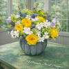 Sunlit yellow garden roses take center stage in this bright floral bouquet