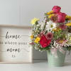 Lovely arrangement in colorful metal pot w/ Roses, Carnations, Daisies and filler