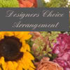 Mixed bouquet with roses, a sunflower, and pink carnations