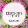 Pink and white floral arrangement with a designer's choice label